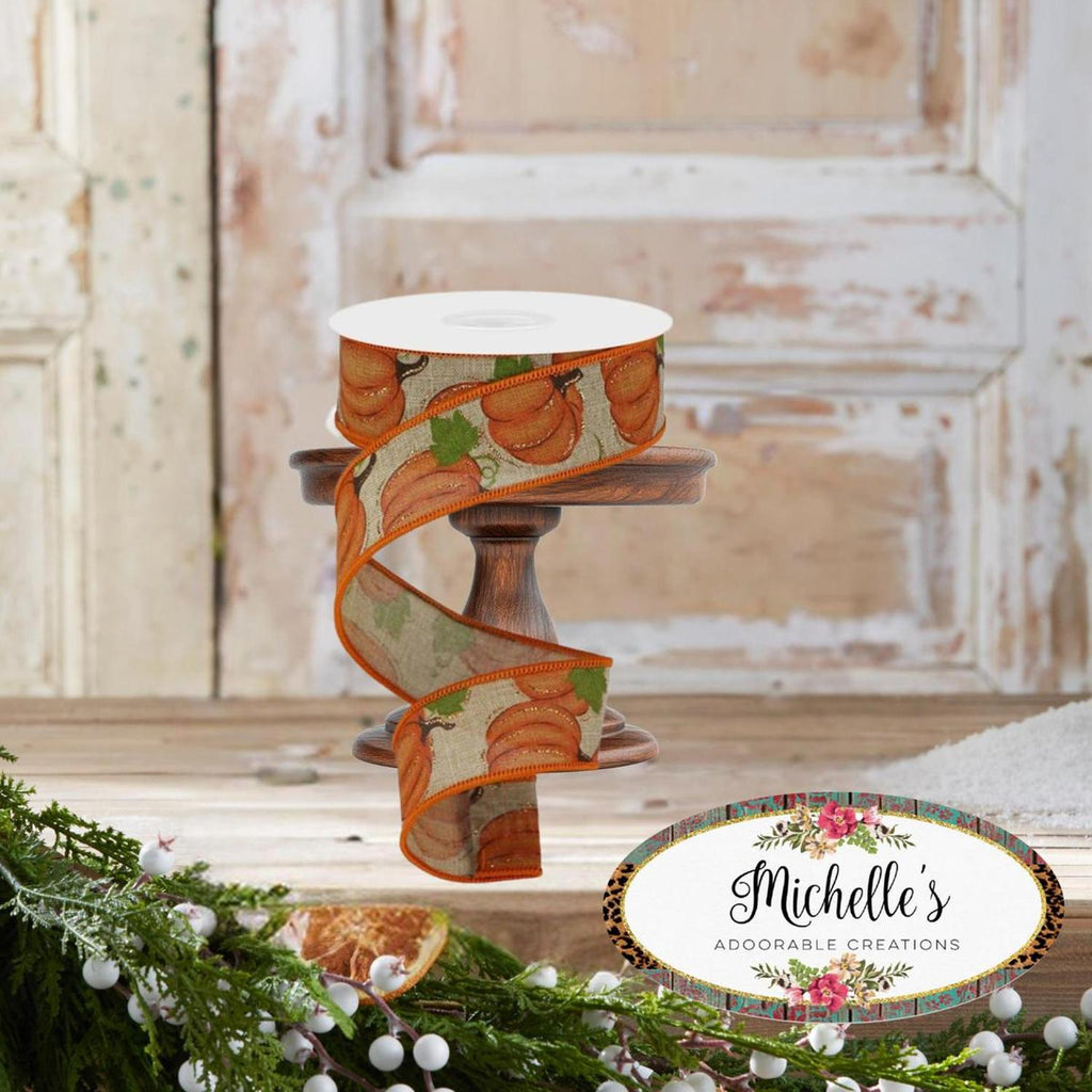 Pumpkin patch ribbon spool, 1.5 in light beige with orange pumpkins and green leaf accents