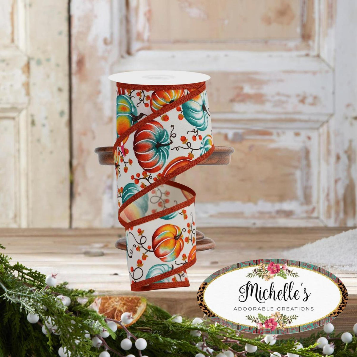 Ivory ribbon roll with pumpkin and floral motif, teal swirls and orange borders