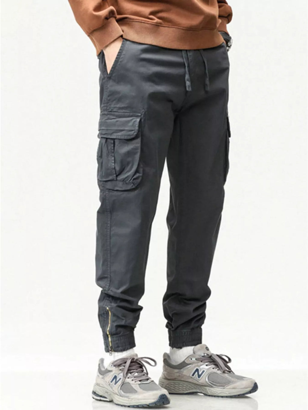 Men's casual cargo pants in charcoal gray with drawstring waist and cargo pocket tabs
