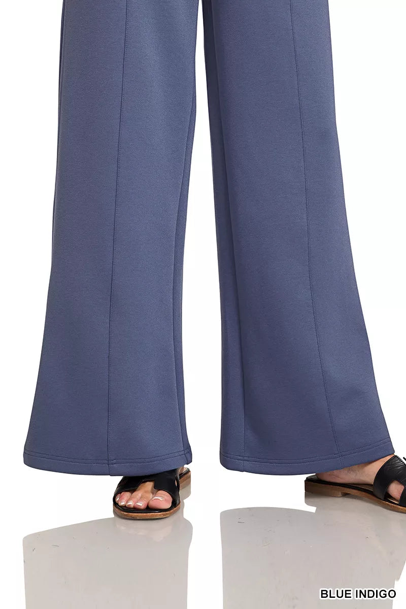 Blue indigo wide-leg center-seam pants with relaxed straight-leg fit