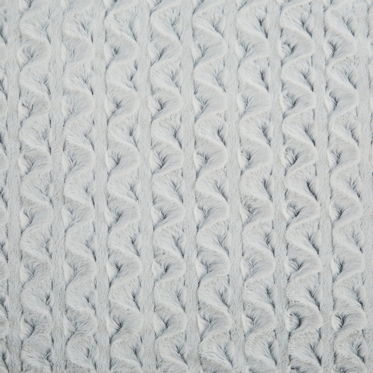 Light blue faux fur throw blanket close-up texture