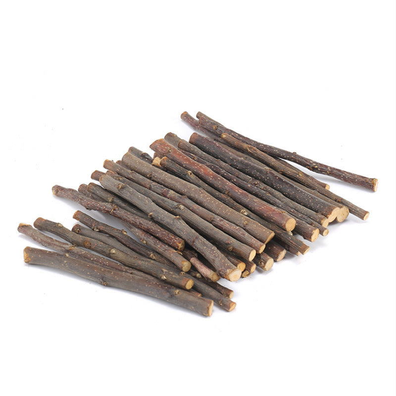 Dried branch pet treats, pile of dark brown sticks with pale cut ends