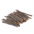 Piled dried branch treat sticks for small pets
