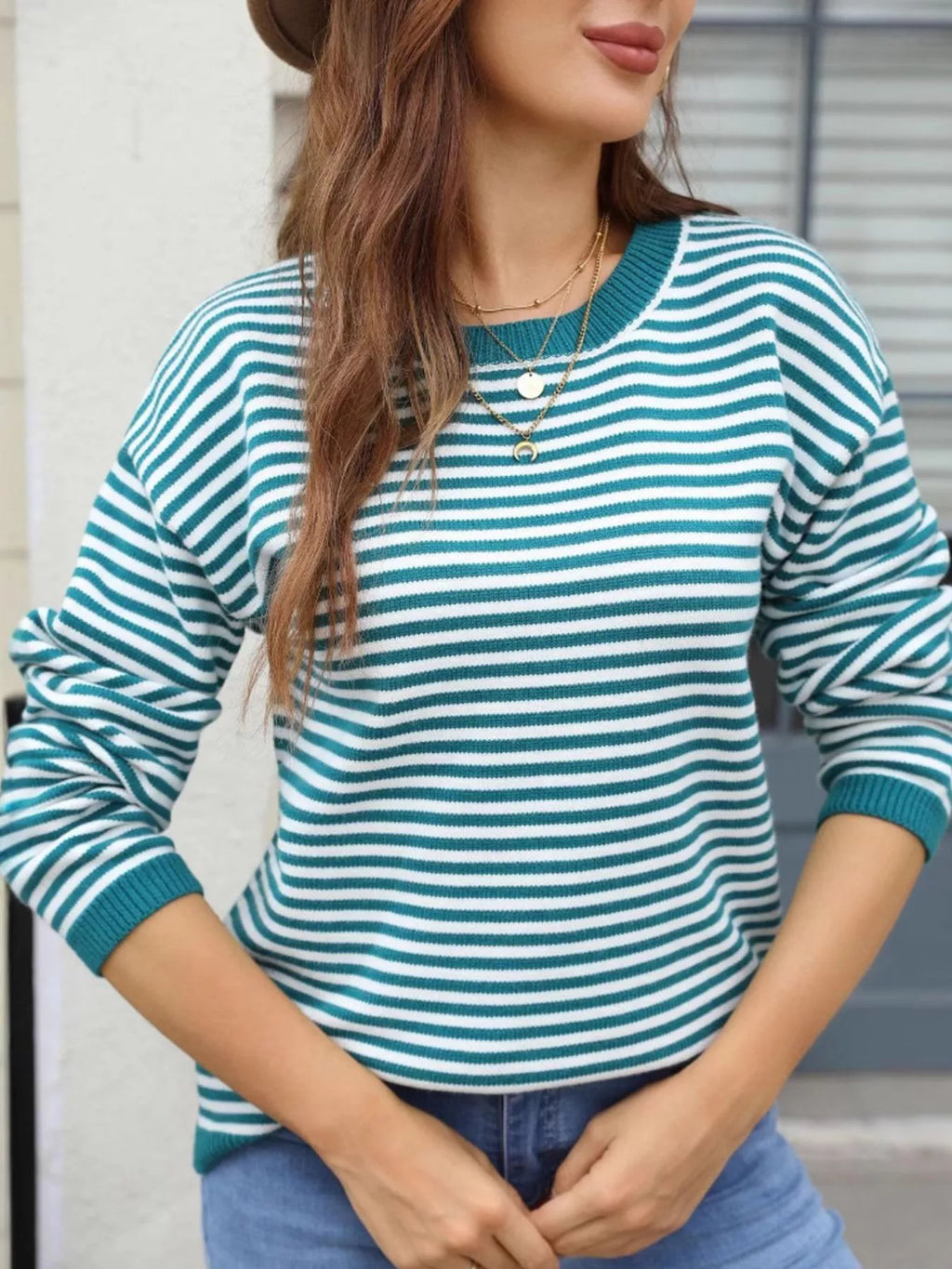 Teal-and-white striped round-neck knit sweater, relaxed fit with ribbed hem