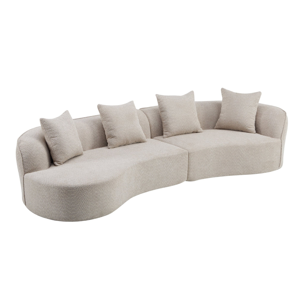 Light beige sectional sofa with deep curved chaise and four throw pillows