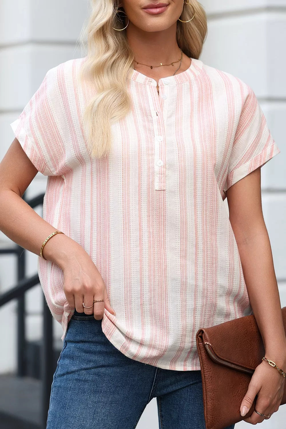 Dusty pink striped short-sleeve blouse with front button placket detail
