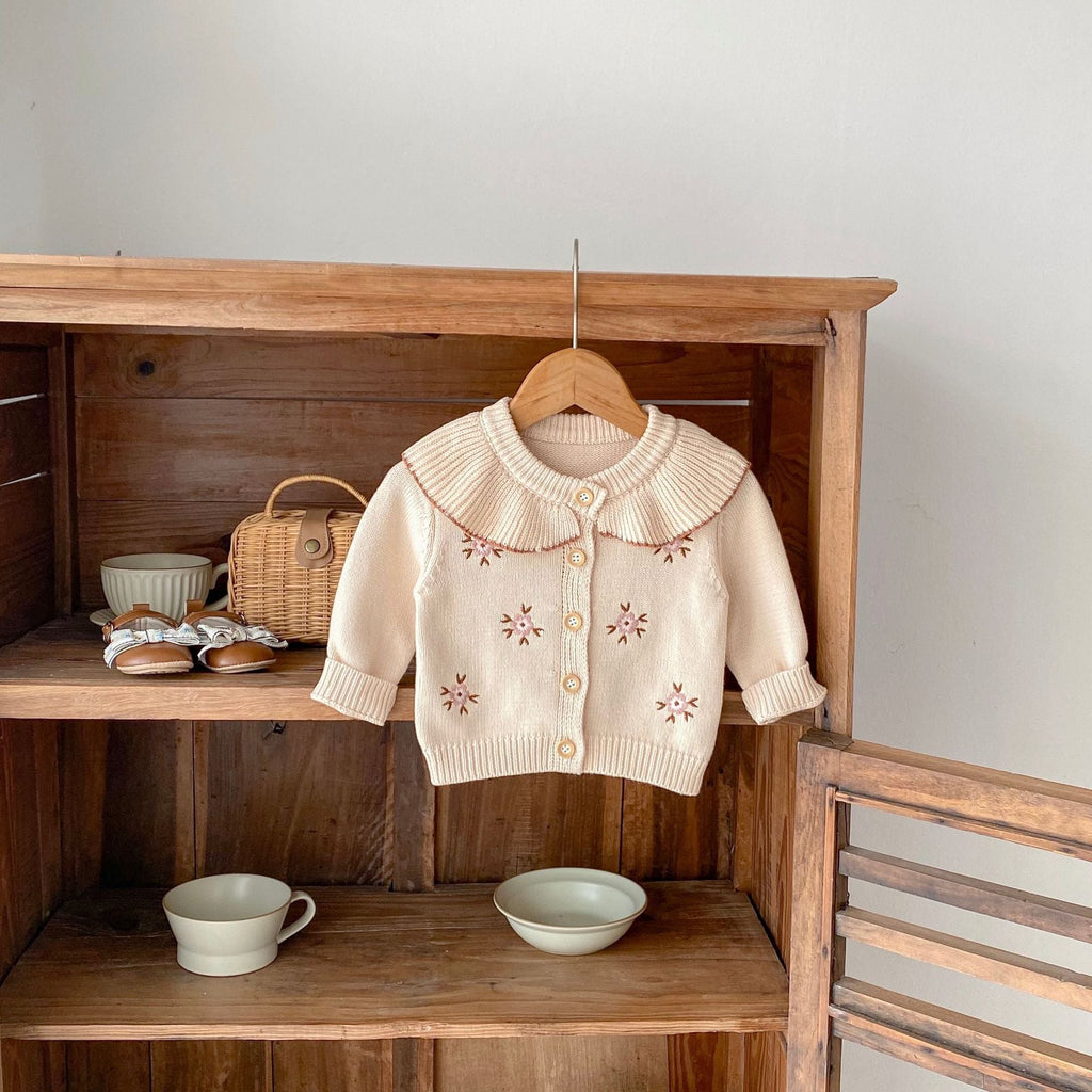 Stone powder baby knitted coat, button-front with embroidered flowers and ribbed cuffs