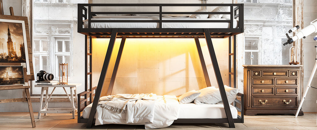 Black metal bunk bed with two mattresses and illuminated space beneath the top bunk
