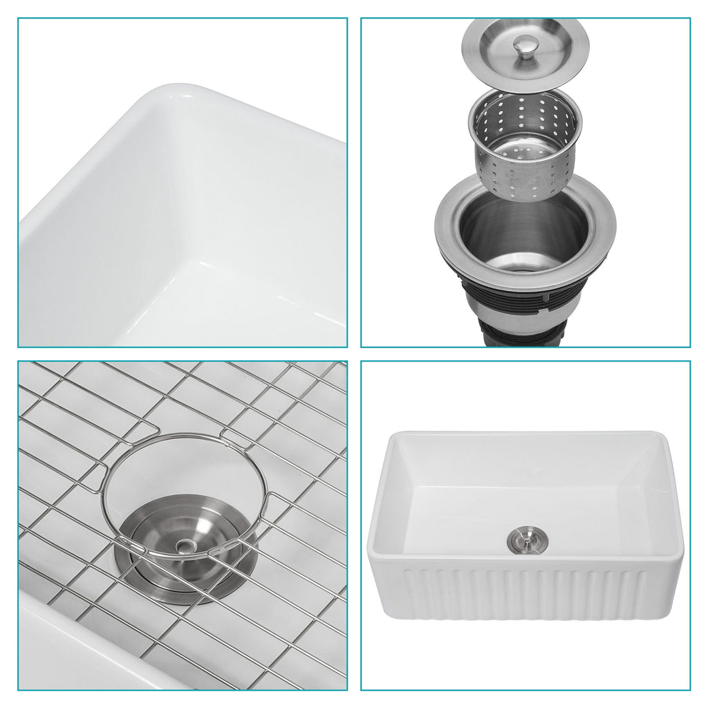 White single-bowl ceramic kitchen sink detail with smooth basin and drain hole