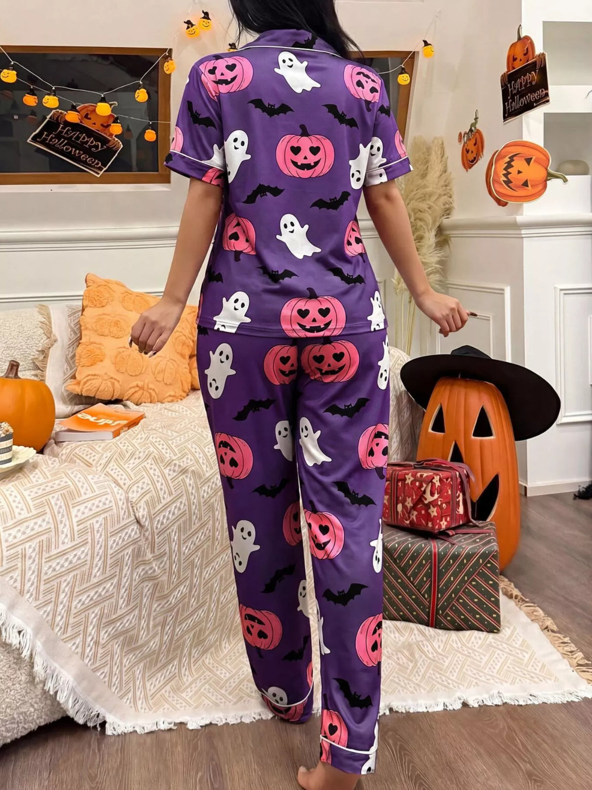 Halloween pajama set, purple button-down top and long pants with pumpkin and ghost print