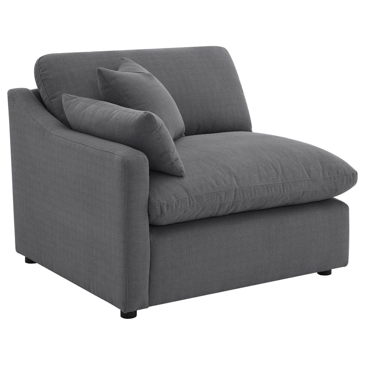 Charcoal upholstered chaise-style sectional with square arms and two accent pillows