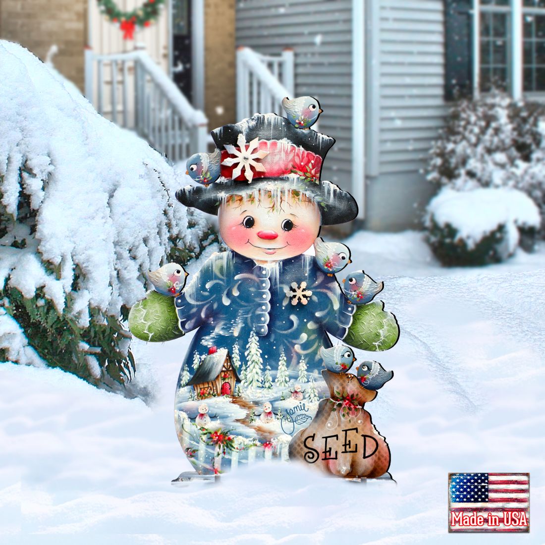 Christmas yard sign snowman with birds and 'SEED' basket, surrounded by snow