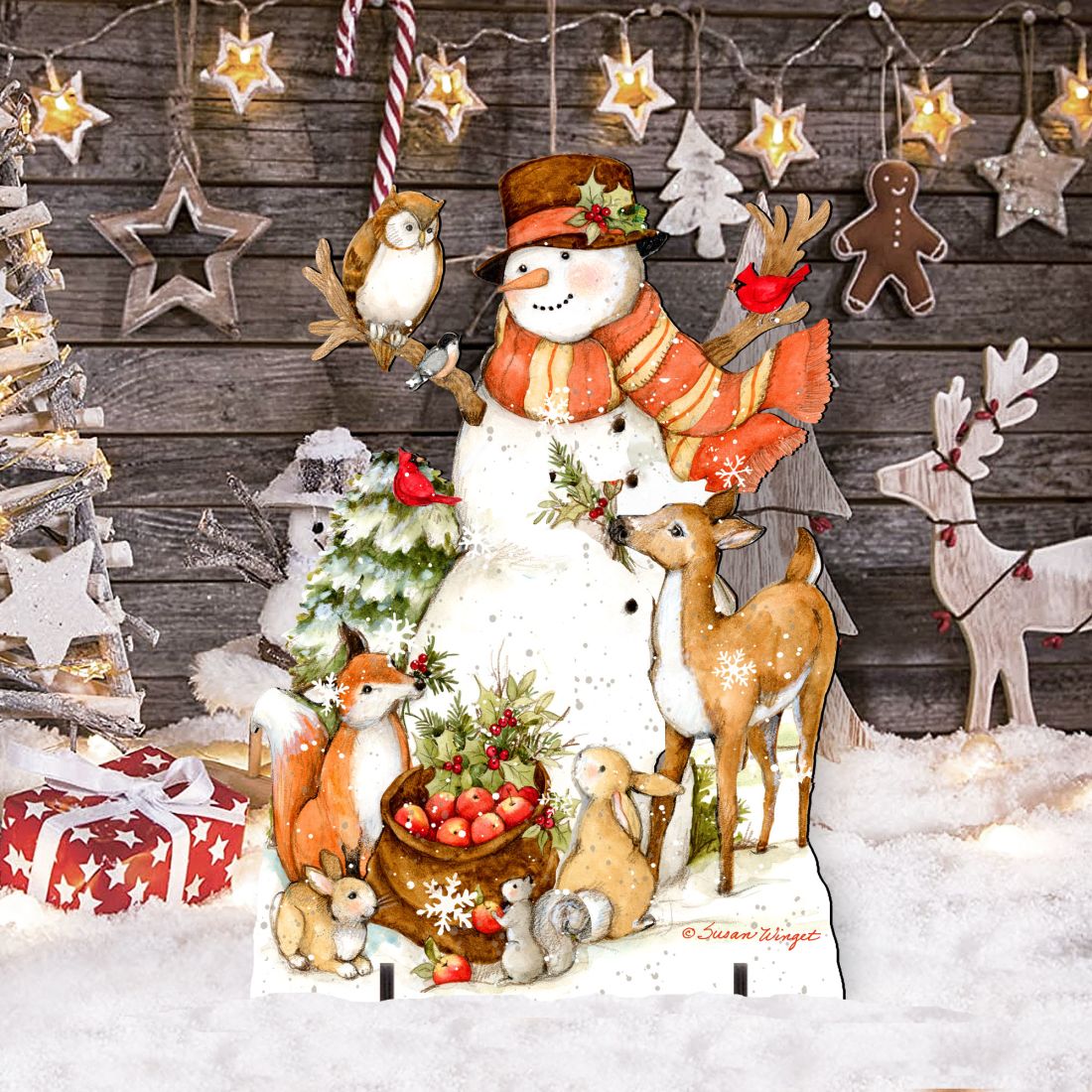 Snowman yard sign with reindeer, rabbits, bird and star decorations along top