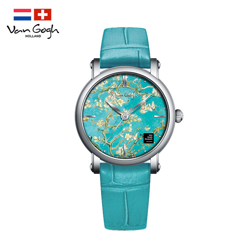 Women's quartz watch with teal floral dial, turquoise leather strap, silver round case.