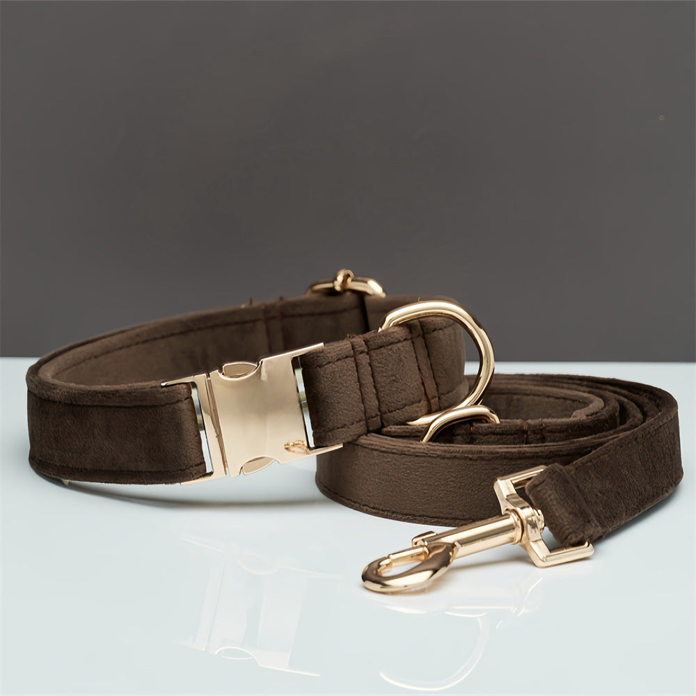 Dark brown velvet dog collar and matching leash with gold-tone hardware, side view