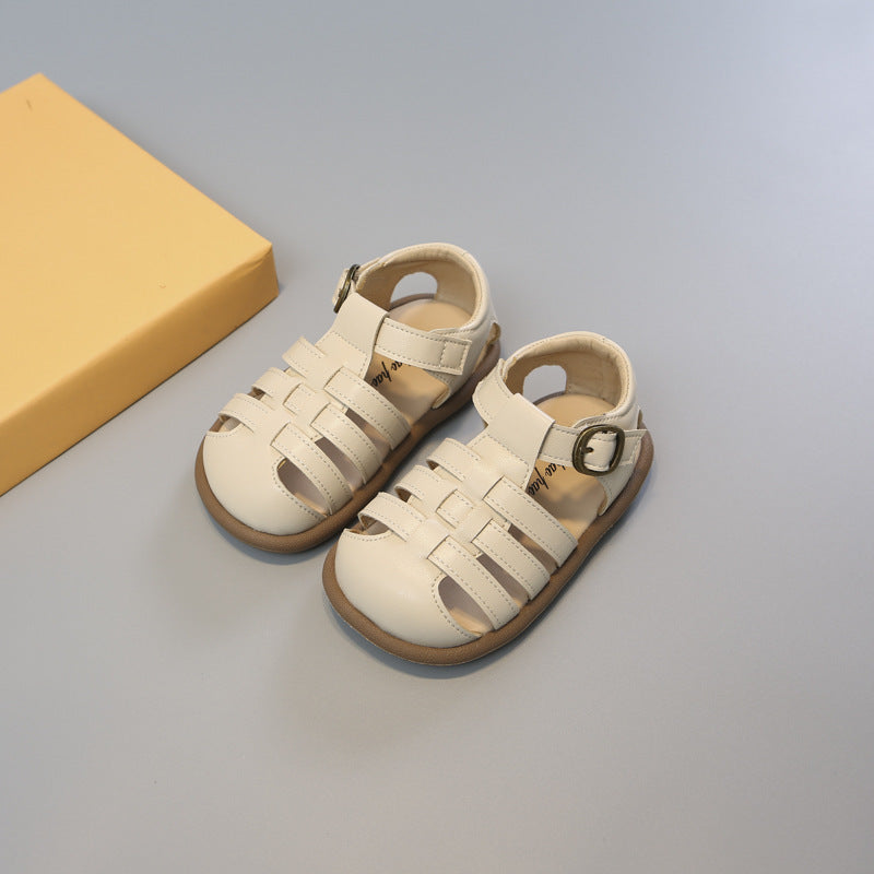 Beige toddler closed-toe woven sandals with hook-and-loop ankle strap