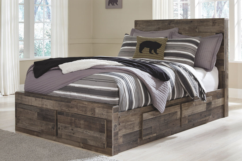 Youth panel bed with dark wood frame and striped comforter, decorative pillows