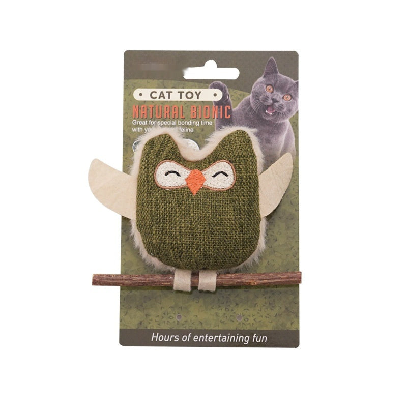 Catnip owl teething stick with green plush owl and feather tail, retail package