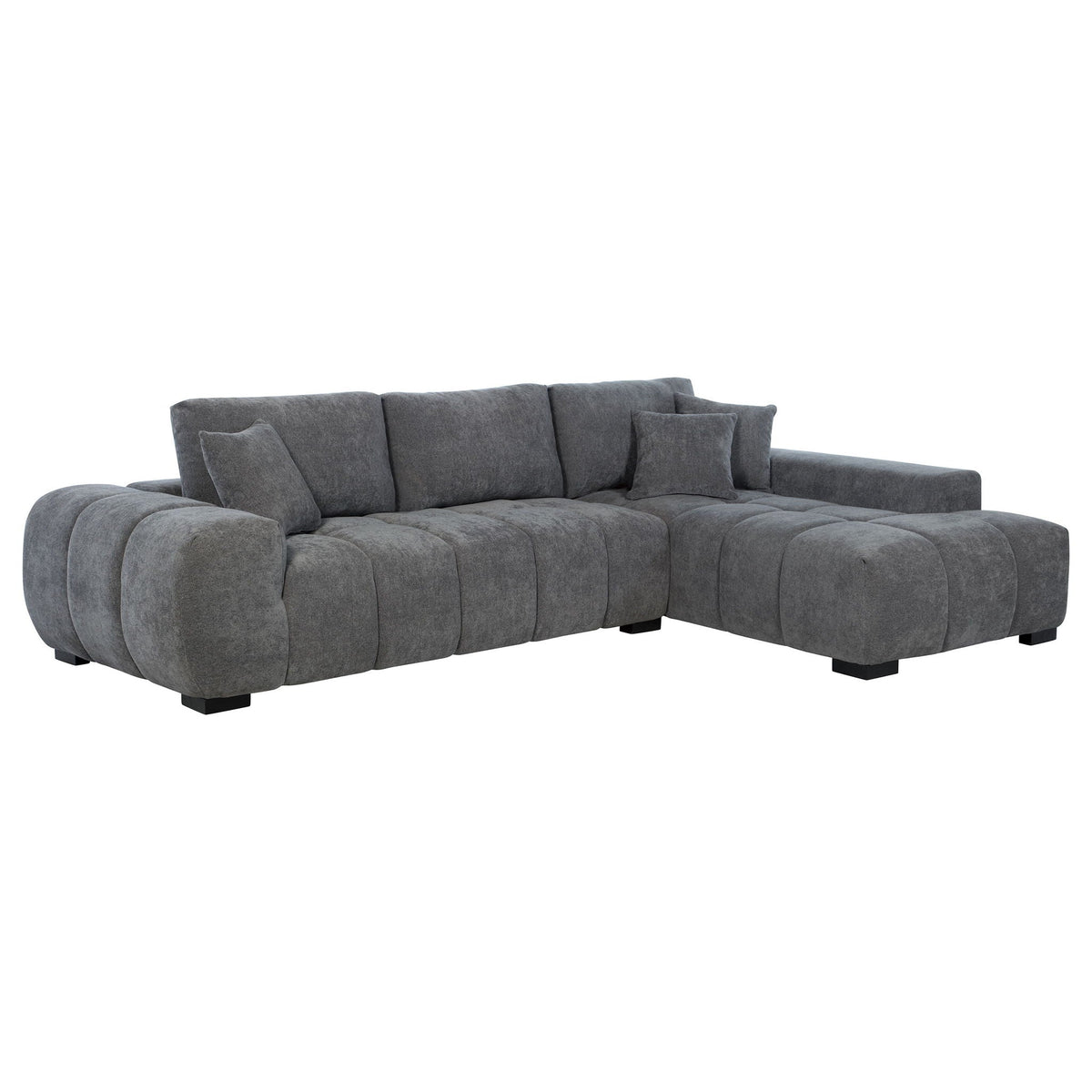 Charcoal gray L-shaped sectional sofa with chaise extension and multiple back pillows