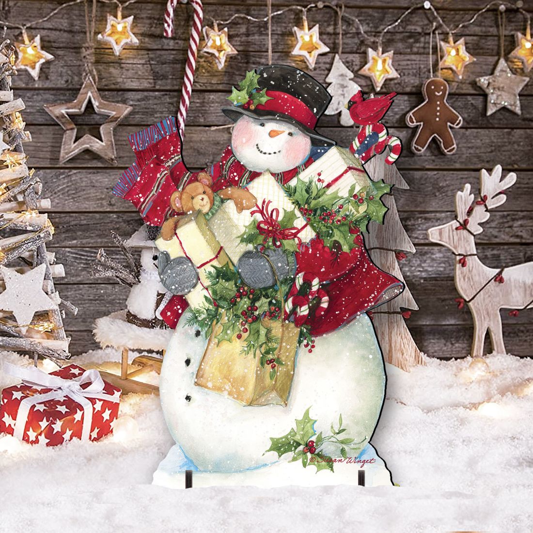 Snowman Christmas yard decoration sign with presents and red bird ornaments on a base