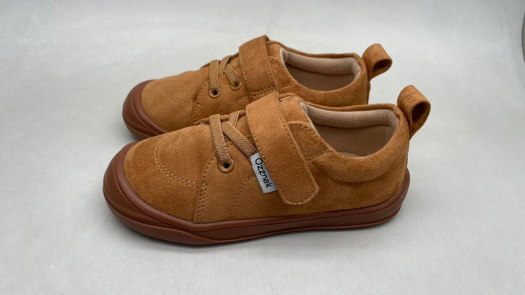 Kids' tan barefoot sneakers with strap and laces, close-up pair