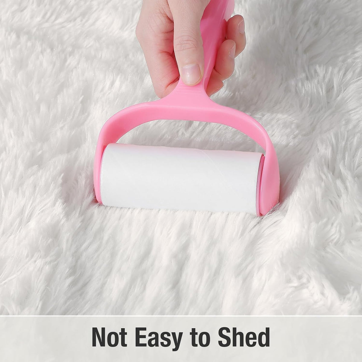 Ivory fluffy shag rug with pink hand tool on plush pile