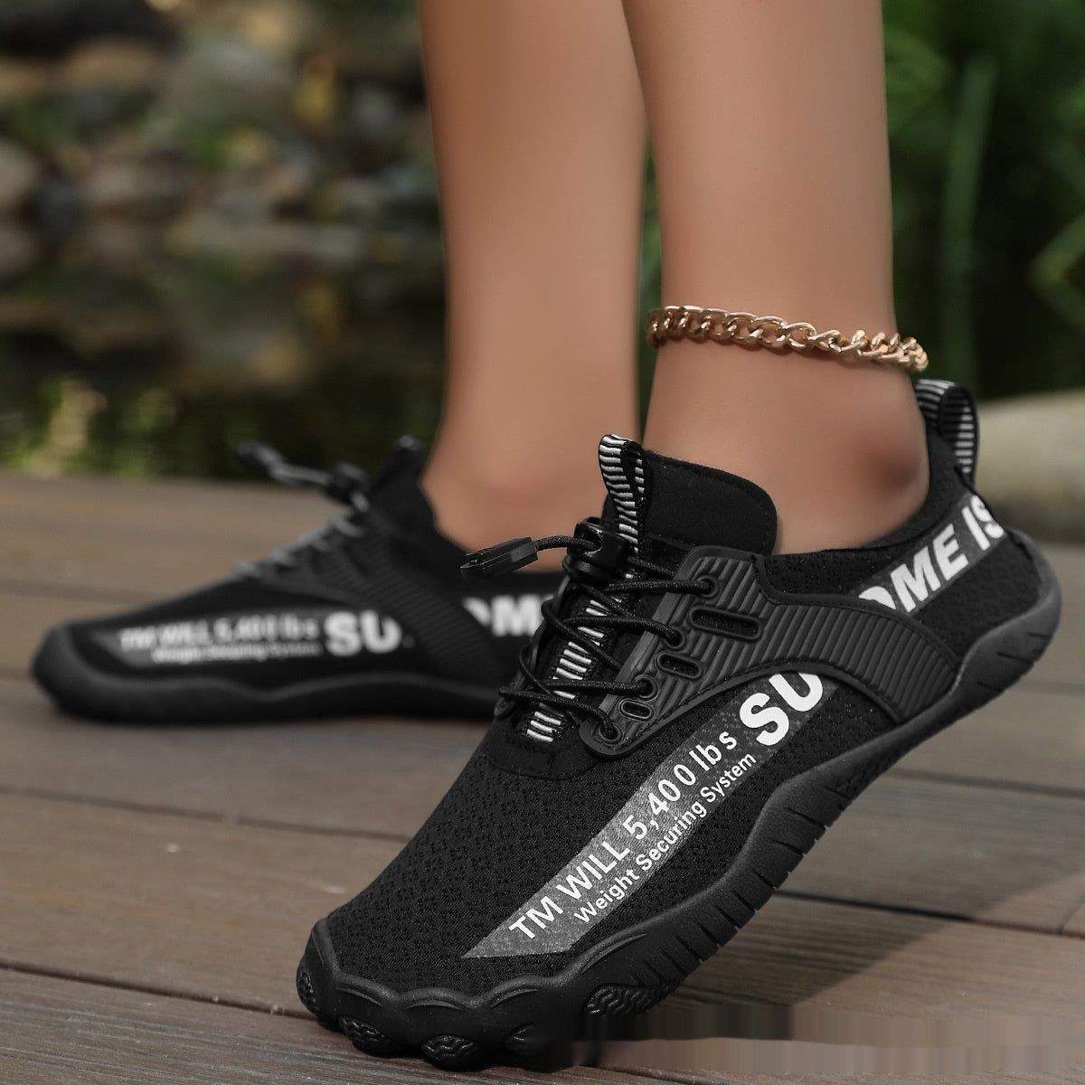 Black lace-up water shoe with thick sole and ankle chain strap