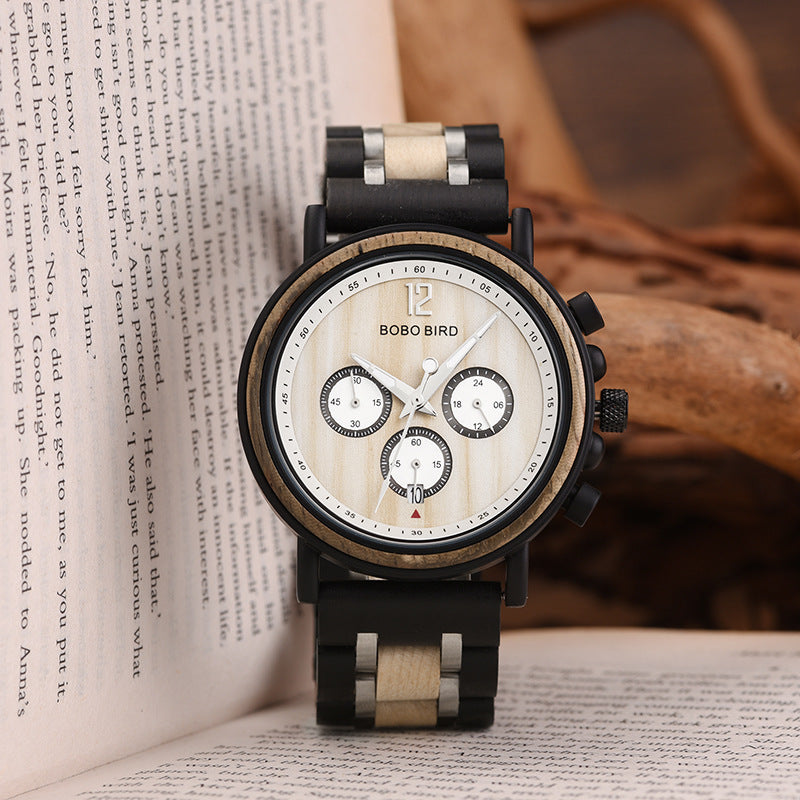 Two-tone sports quartz wristwatch with black case, beige accents, and white dial