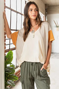 Color-block V-neck short-sleeve t-shirt, cream with orange sleeve trim