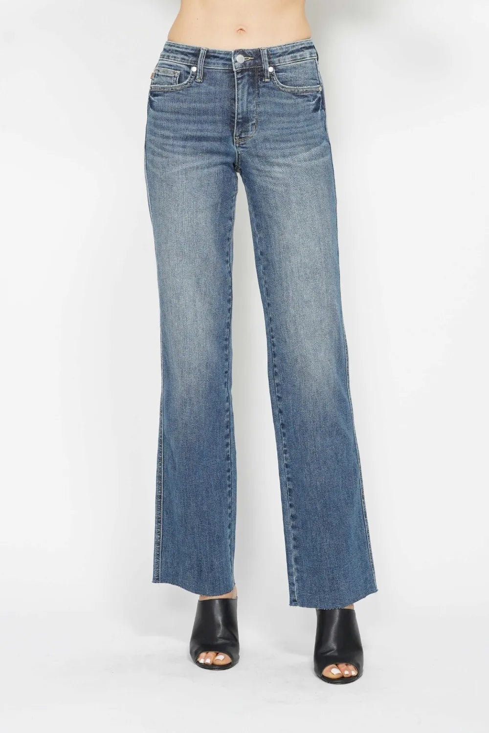 Medium-wash straight-leg jeans with button-front closure and belt loops