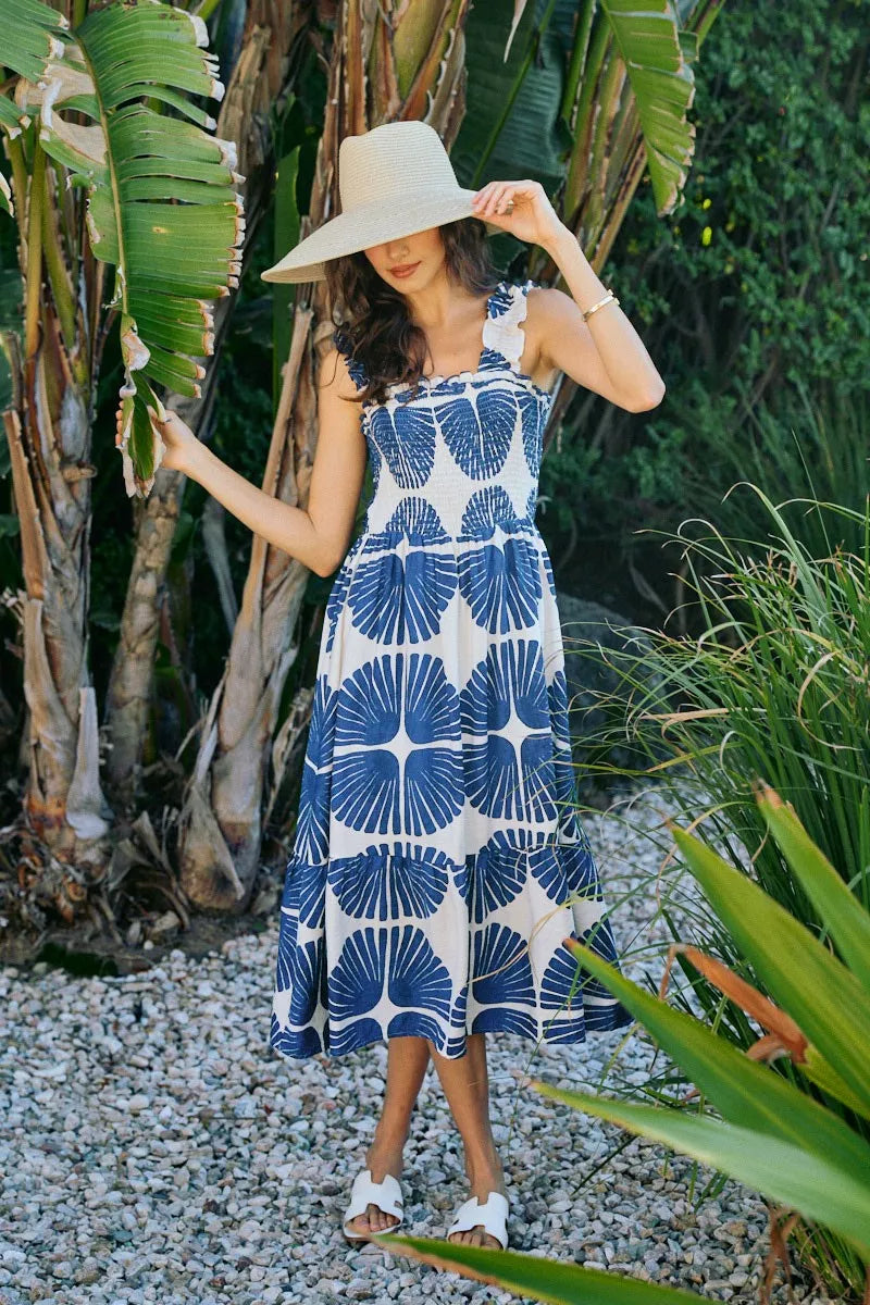 Navy and white abstract print tiered midi dress with smocked bodice, sleeveless cut