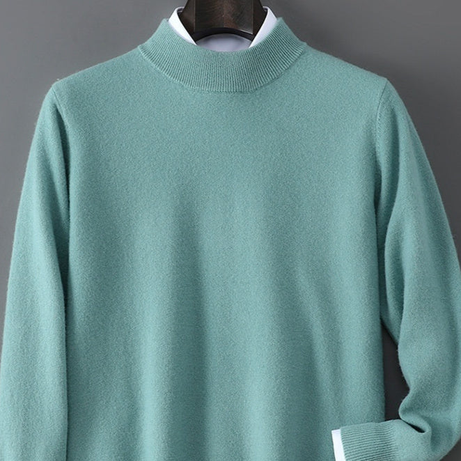 Men's cashmere base-layer sweater in teal, crew neck, ribbed collar and cuffs.