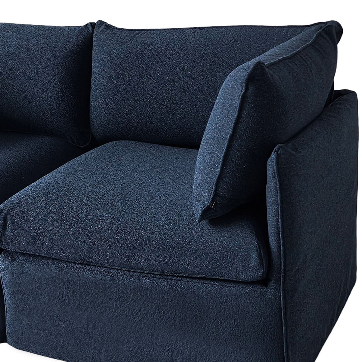Blue upholstered patio sectional sofa close-up of armrest and seat cushion