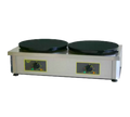 Electric double crepe roller grill with two round cast-iron plates and control dials
