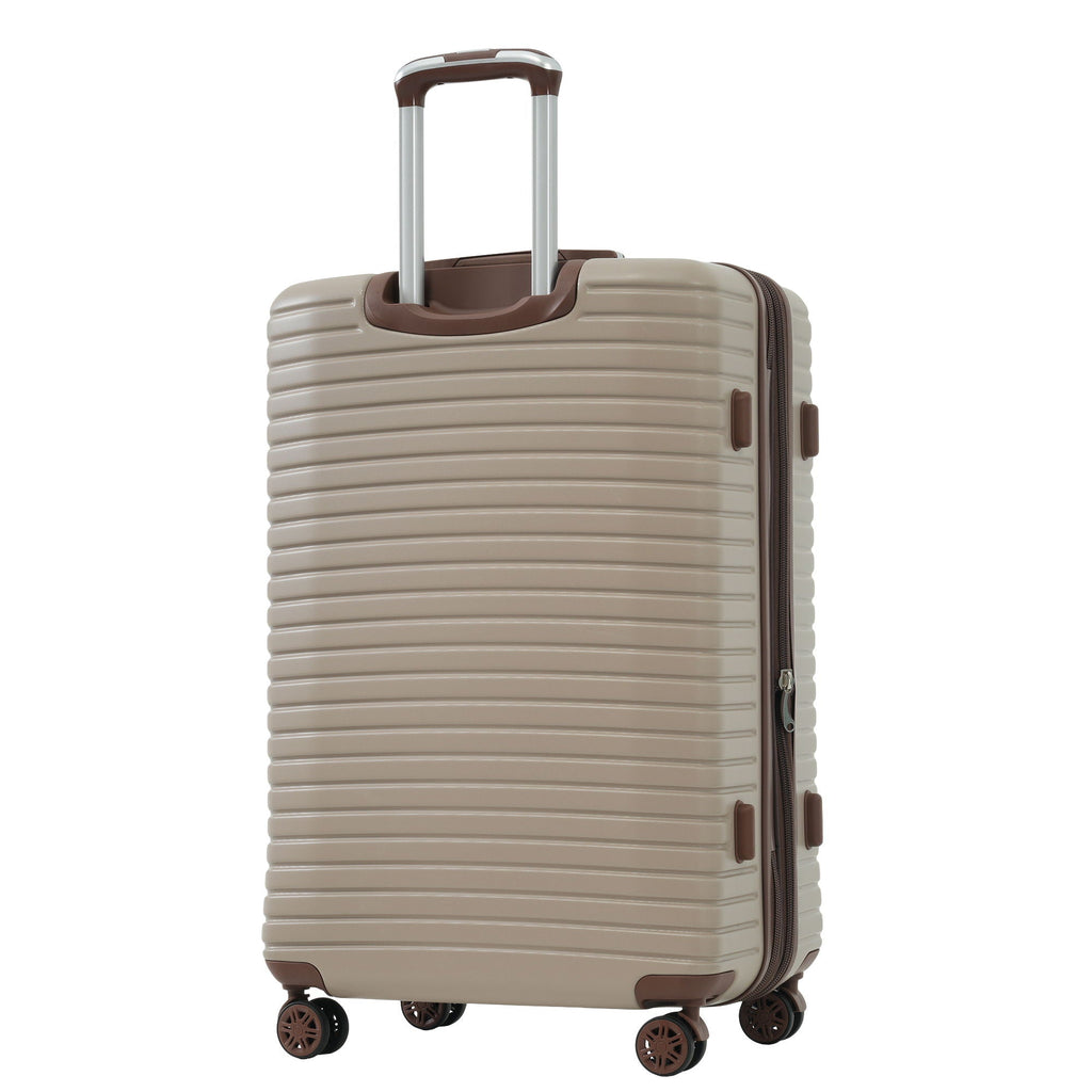Beige hard-shell upright suitcase front view with brown trim, telescoping handle, and spinner wheels.