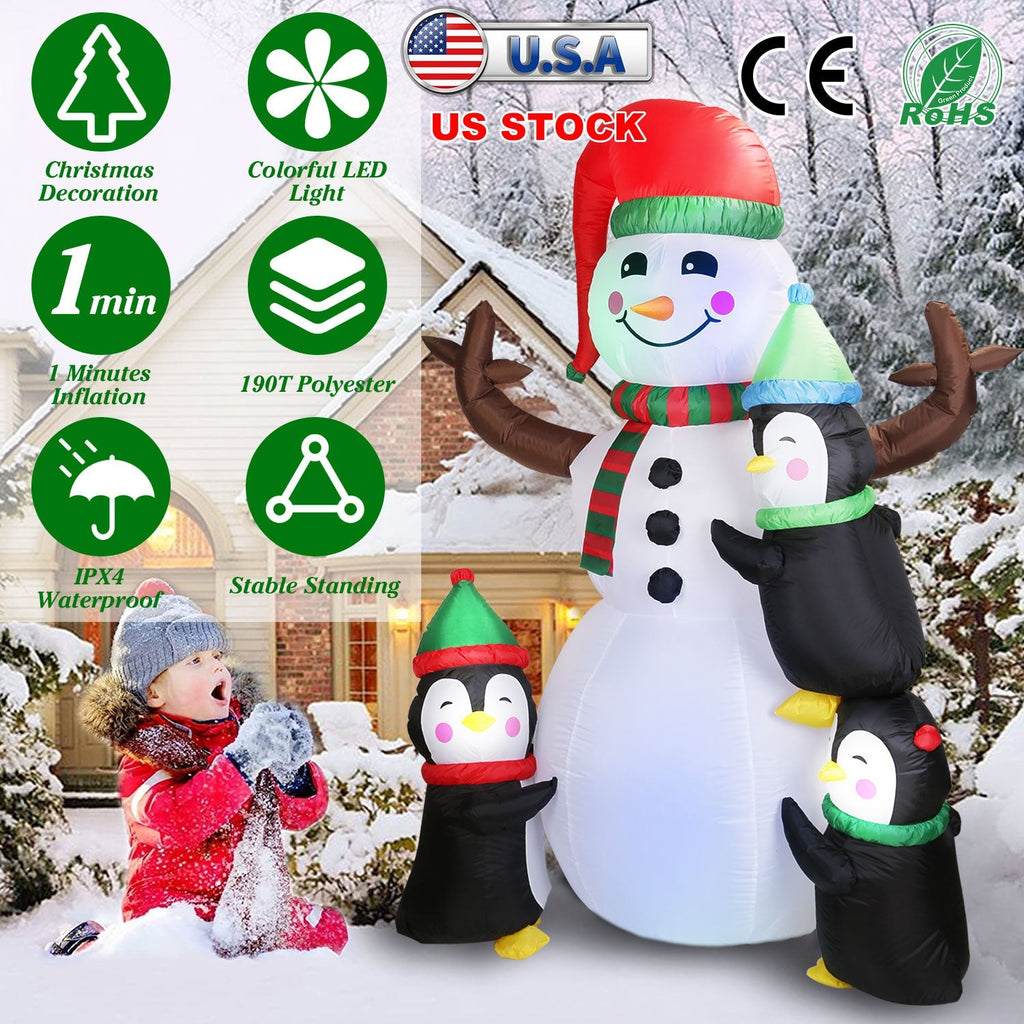 Inflatable snowman with penguins and red hat, striped scarf, winter yard decoration