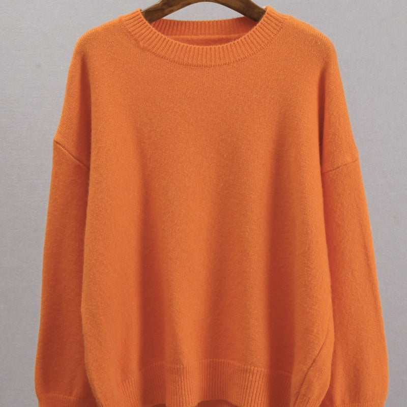 Orange knitted crew-neck loose sweater with ribbed collar and hem, long sleeves