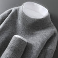 Men's cashmere base-layer sweater in heather gray, crew neck with ribbed collar and cuffs.