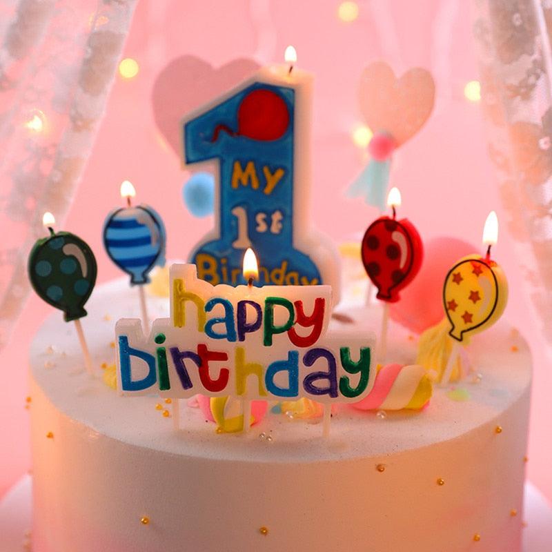 Blue "My 1st Birthday" number 1 candle topper with floating pastel party candles