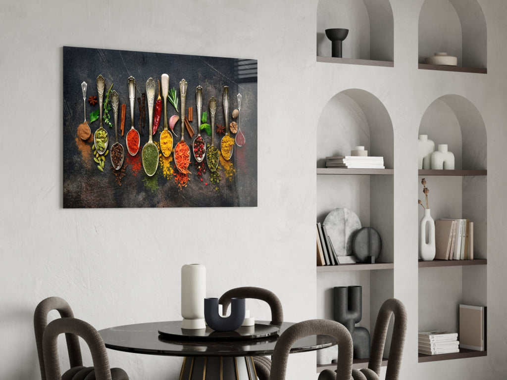 Glass wall art panel with colorful spice spoons and herbs on a dark textured background