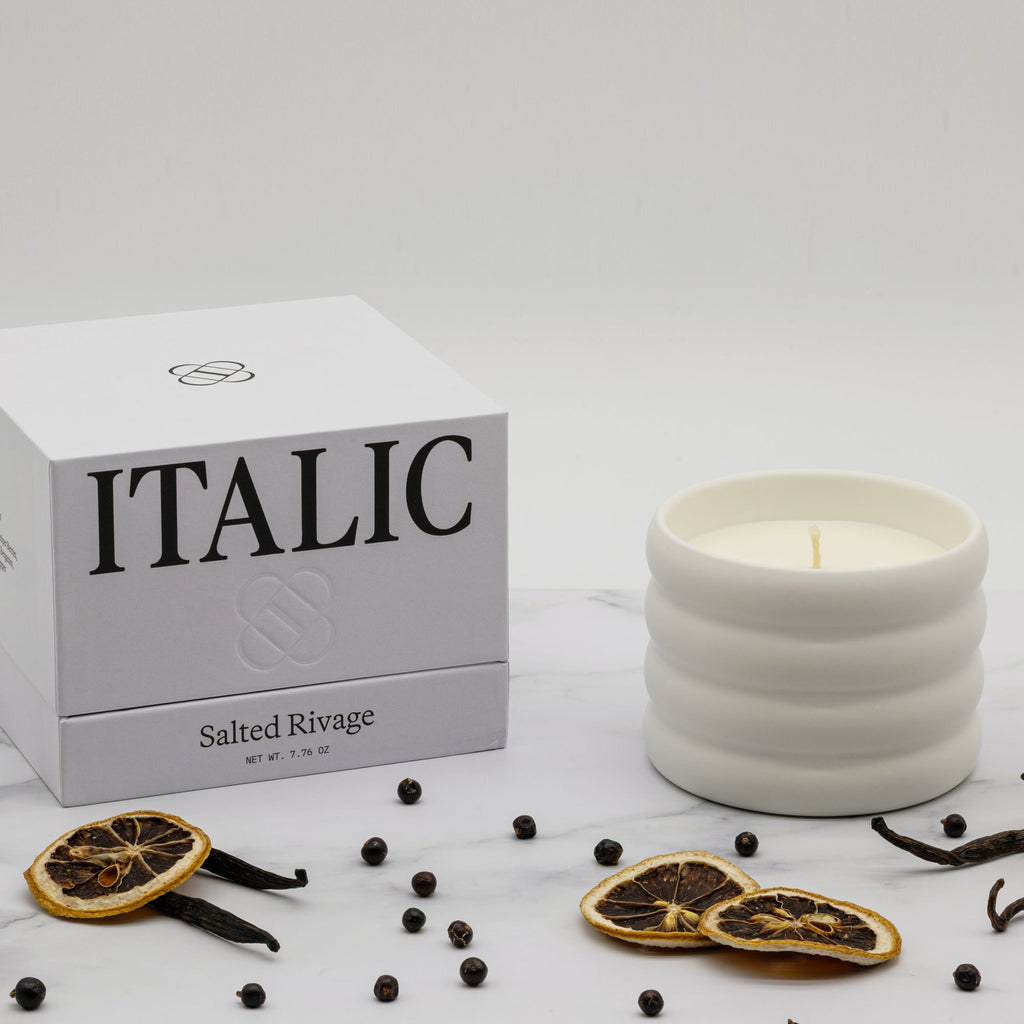 Soy wax ceramic candle in ribbed light-gray ceramic jar with flame; Salted Rivage box.