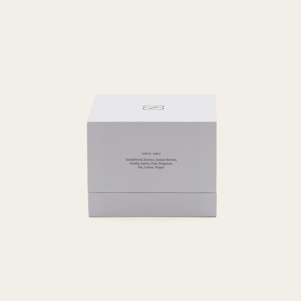 Soy wax ceramic candle box with branding and ingredient text on the back.