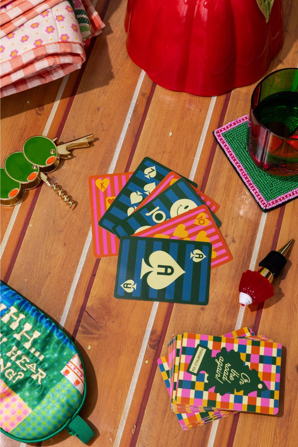 Waterproof playing cards deck with colorful plaid and illustrated faces on top