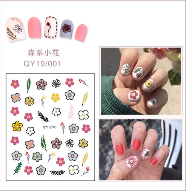 Colorful small flower nail stickers sheet with daisies, leaves, and blooms