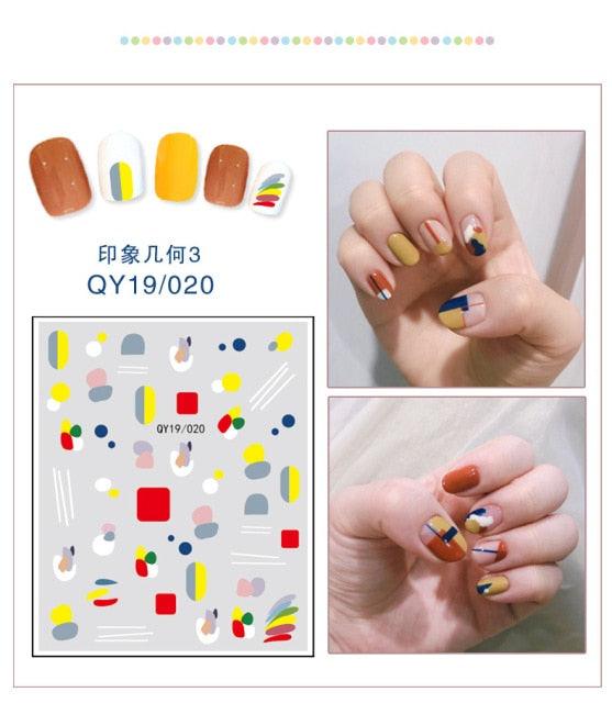 Geometric and striped nail sticker set with small icons for nail art