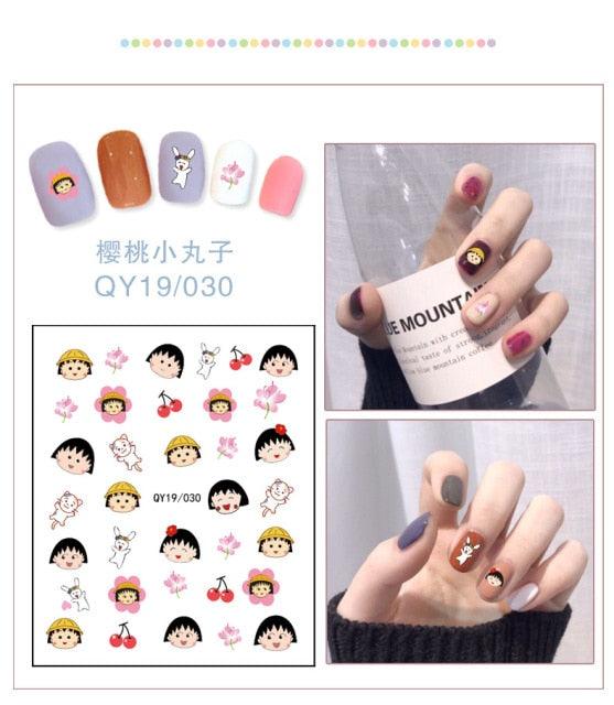 Cartoon character nail stickers with bunny, girl faces, and small hearts