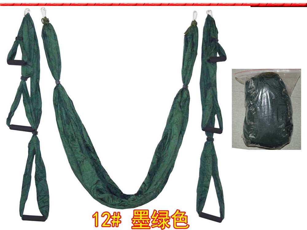 Dark green aerial yoga hammock swing with hanging straps and end loops