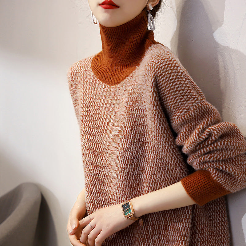 Women’s knit turtleneck sweater in orange, relaxed silhouette with ribbed cuffs and hem.