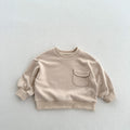 Ivory solid pullover sweatshirt with round neck and front kangaroo pocket