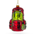 Red and green glass backpack Christmas ornament with gold hanging loop